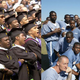 Students at a Morehouse College commencement (Getty); prisoners at the Avon Park Correctional Facility (Getty)
